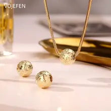 18K Gold Sun & Moon Pendant Necklace and Bracelet Set